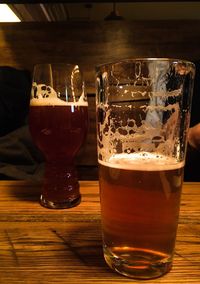 Close-up of beer glass on table