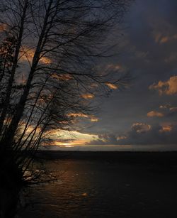 Scenic view of sea against sky at sunset