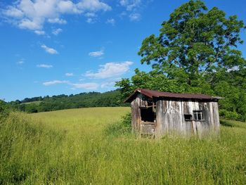 House on field against sky