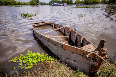 High angle view of abandoned boat moored in lake