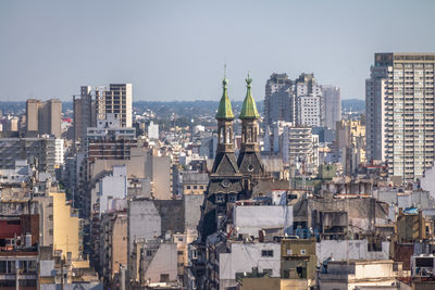 Cityscape against clear sky