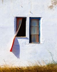 White house window on wall of building