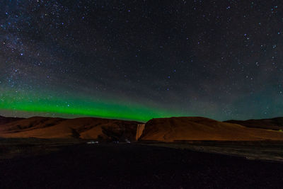 Scenic view of star field against sky at night