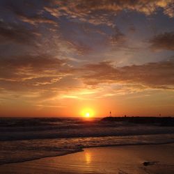 Scenic view of sea at sunset