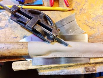 Close-up of work tools on metal