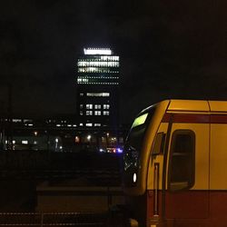 Illuminated buildings in city at night