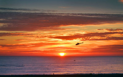 Scenic view of sea at sunset