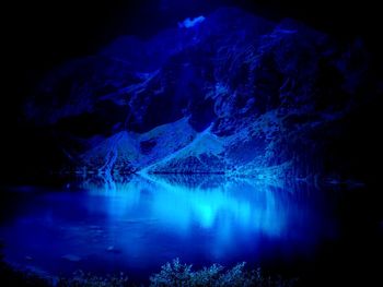 Scenic view of rock formation in lake