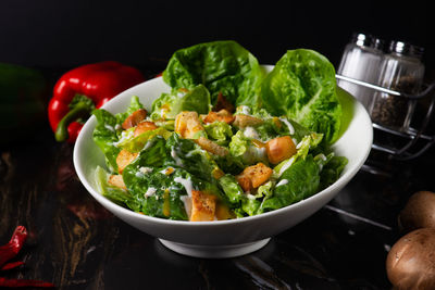 Close-up of salad in bowl on table