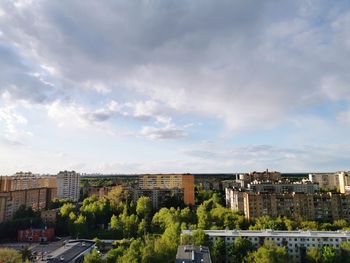 High angle view of buildings in city against sky