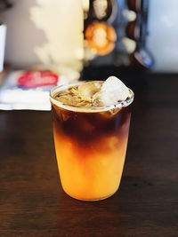 Close-up of ice cream in glass on table