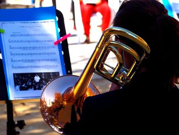 Close-up of person playing piano