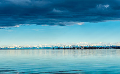 Scenic view of sea against blue sky