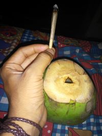Close-up of man holding ice cream