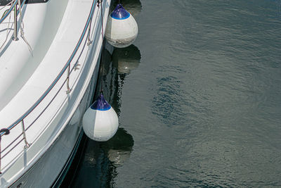 High angle view of sailboat moored on sea