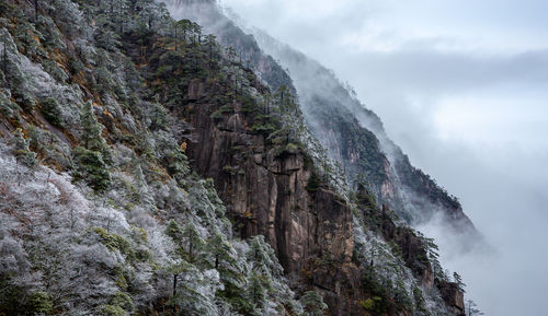 Scenic view of rocky mountains against sky