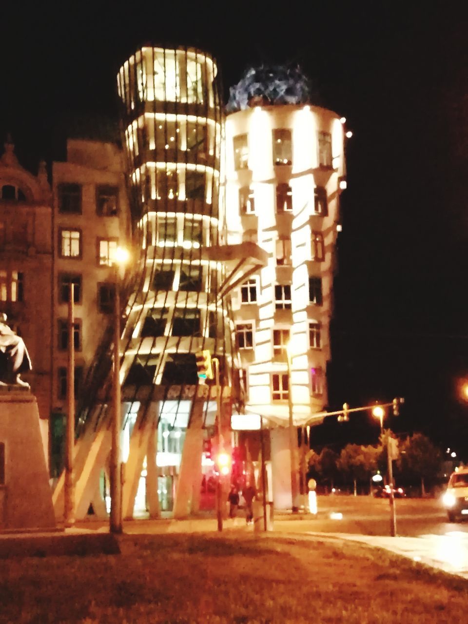 ILLUMINATED BUILDINGS AT NIGHT