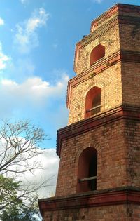 Low angle view of historic building against sky