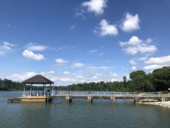 Bridge over river against sky