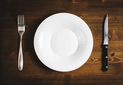 High angle view of empty plate on table