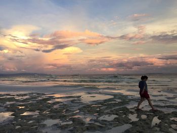 Scenic view of sea at sunset