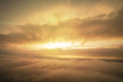 Low angle view of dramatic sky during sunset