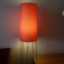 Close-up of illuminated lamp on wall at home