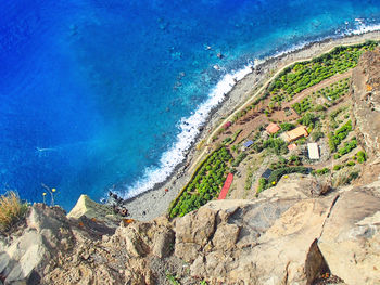 Panoramic view of beach against blue sky