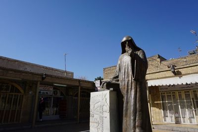 Low angle view of statue against clear sky