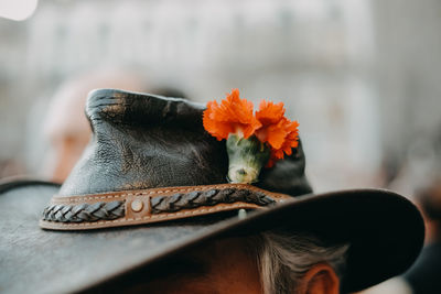 Close-up of orange flowers on table