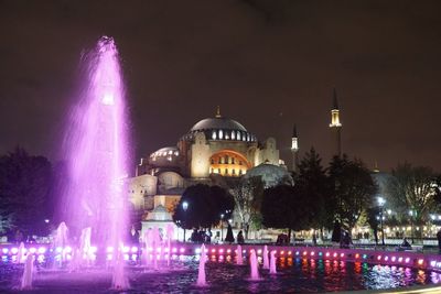 Illuminated building at night