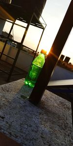Close-up of glass bottle on table