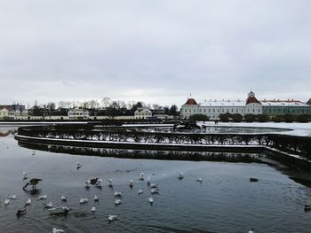 View of river with buildings in background