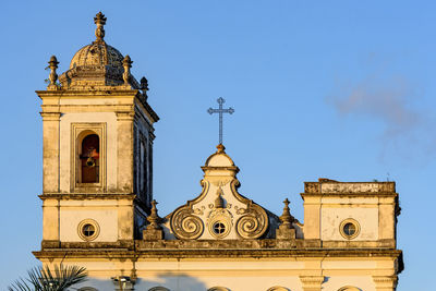 Details of historic bell tower and facade of old baroque church in pelourinho district in salvador