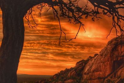 Scenic view of dramatic sky during sunset