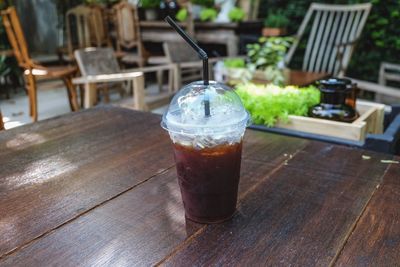 Close-up of iced tea served on table