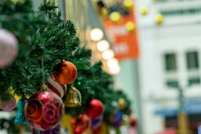 Close-up of christmas decoration hanging on tree