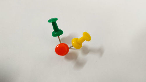 Close-up of multi colored toy against white background