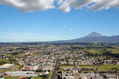 Aerial view of cityscape against sky