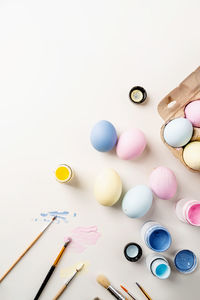 High angle view of pills on white background