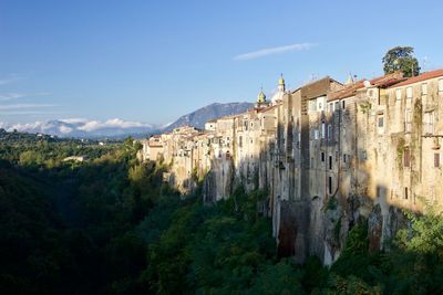 Panoramic shot of old buildings against sky