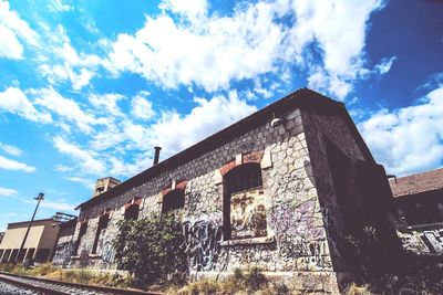 Low angle view of old building against sky