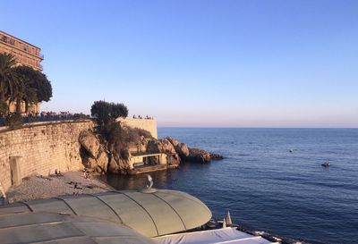 Scenic view of sea against clear blue sky