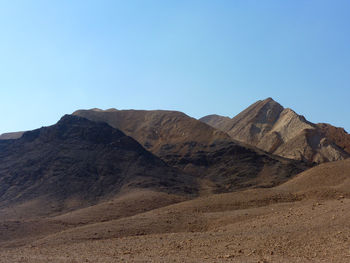 Scenic view of mountains against clear sky