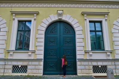 People standing outside building