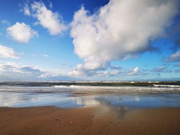 Scenic view of beach against sky