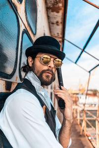 Portrait of young man wearing sunglasses