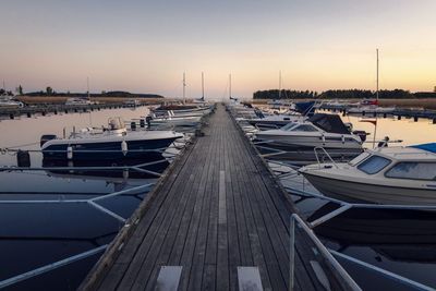 Boats moored at harbor