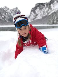 Portrait of smiling girl in snow