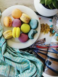 High angle view of multi colored candies on table